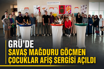 GRÜ’DE SAVAŞ MAĞDURU GÖÇMEN ÇOCUKLAR AFİŞ SERGİSİ AÇILDI